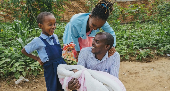 Image of JP Hategekimana Supply Chain Hero in Rwanda and his family