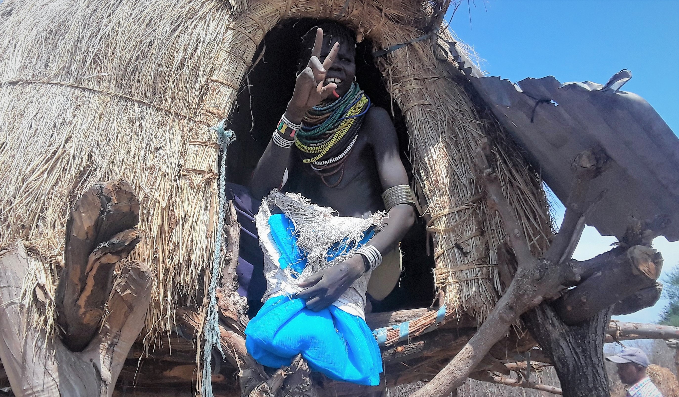 Man sits in home in rural Ethiopia