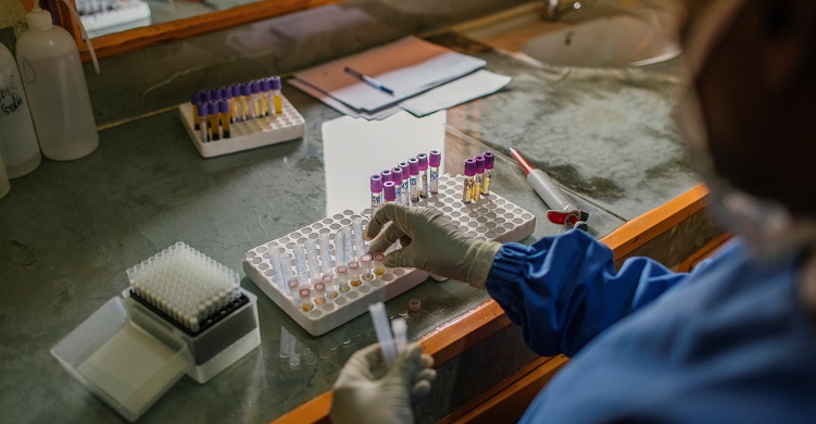 Laboratory technician working with test samples