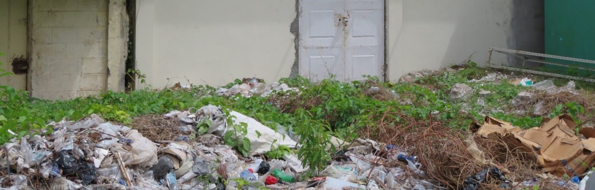 Trash in the Back Garden of a Health Facility