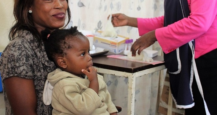 Baby Brigette who is HIV negative is brought in for a check up at 18 months with her mother.