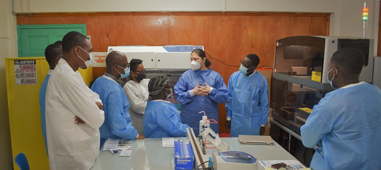 Lab trainees in Haiti being trained on new lab testing equipment
