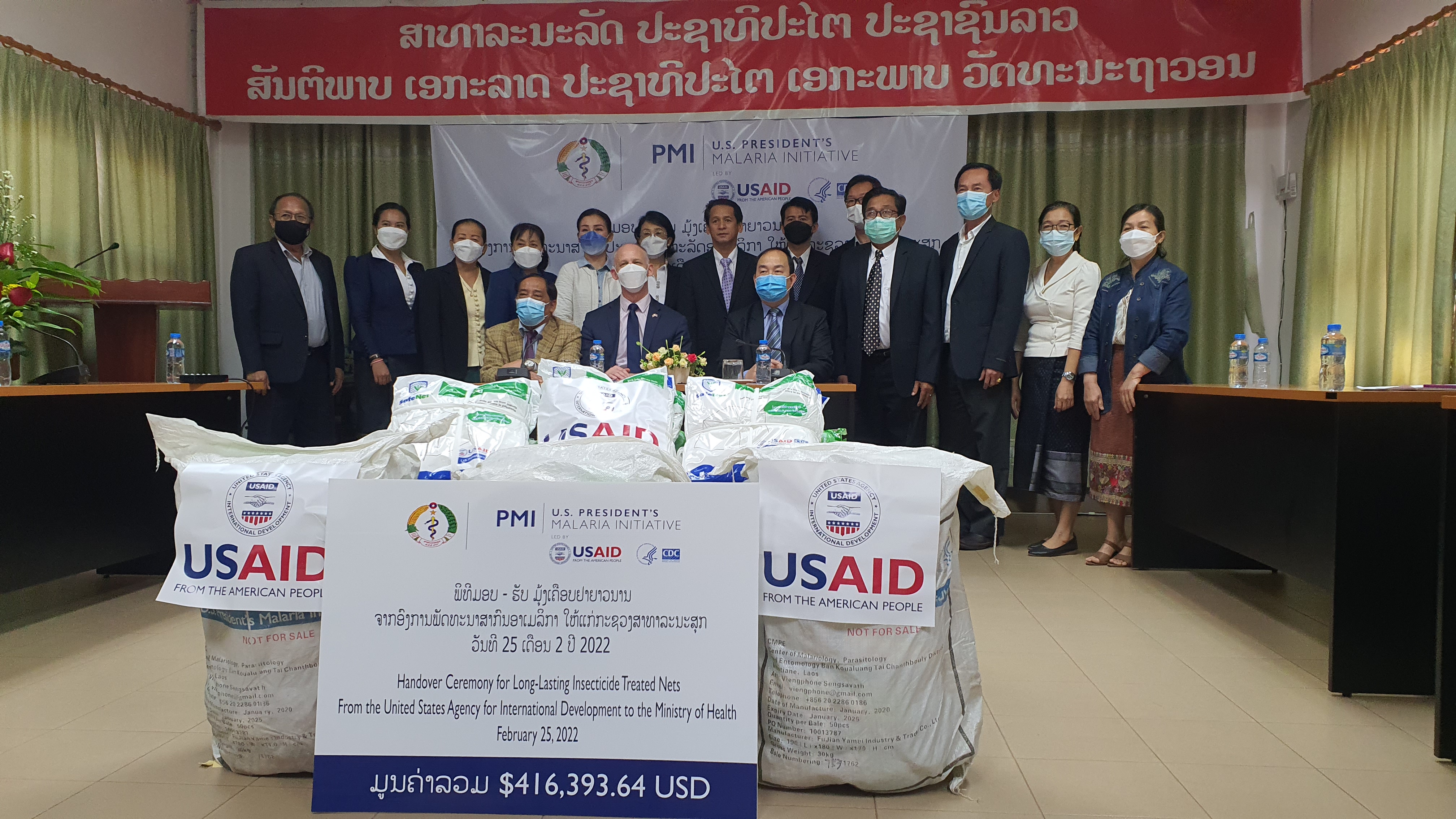 USAID Country Representative Michael Ronning leads the handover ceremony for the donation of bednets to the Laos Government.