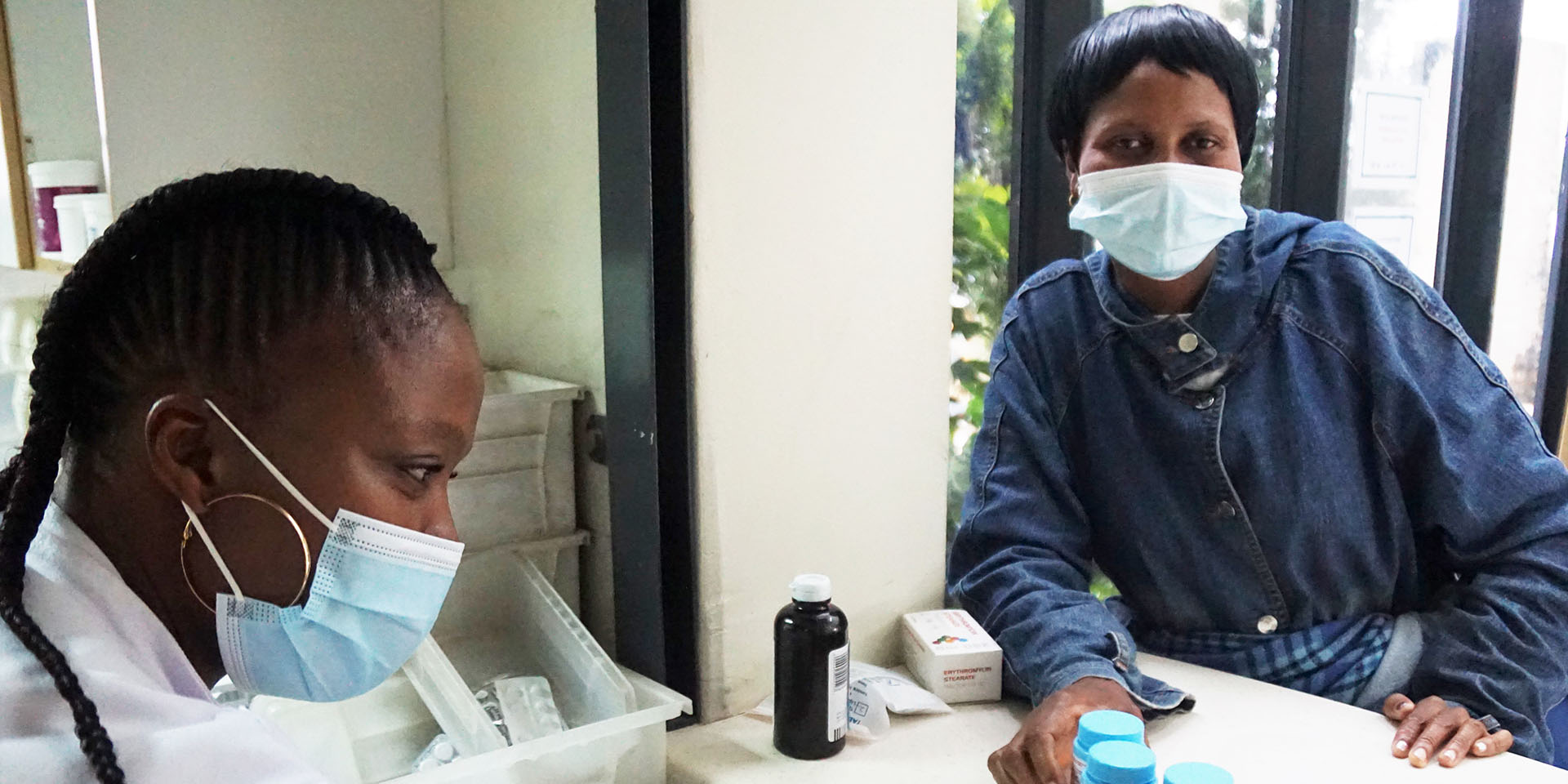 A patient getting HIV commodities in Lesotho