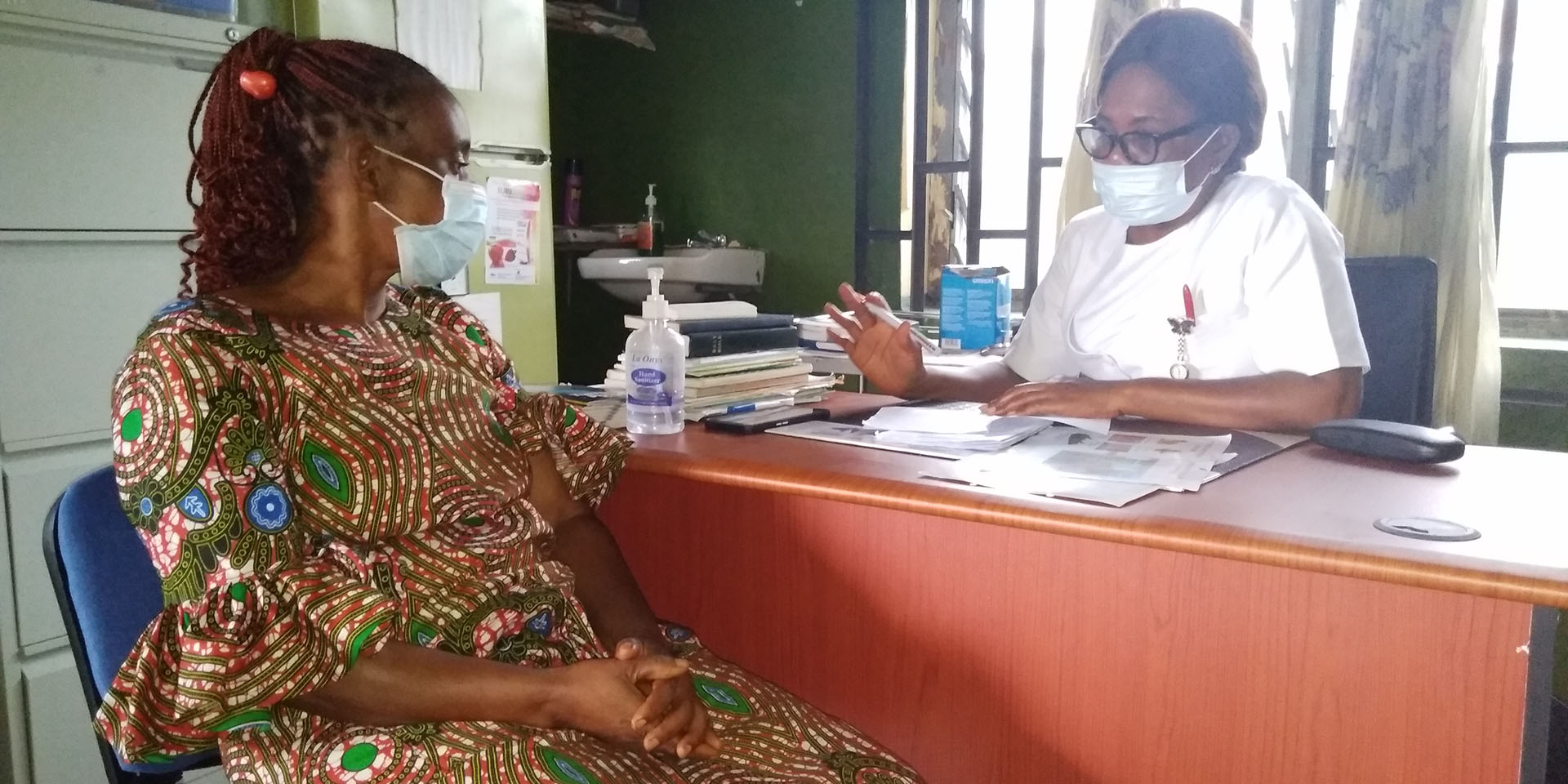 Mercy Bassey, Officer in Charge, West Itam PHC attending to a client