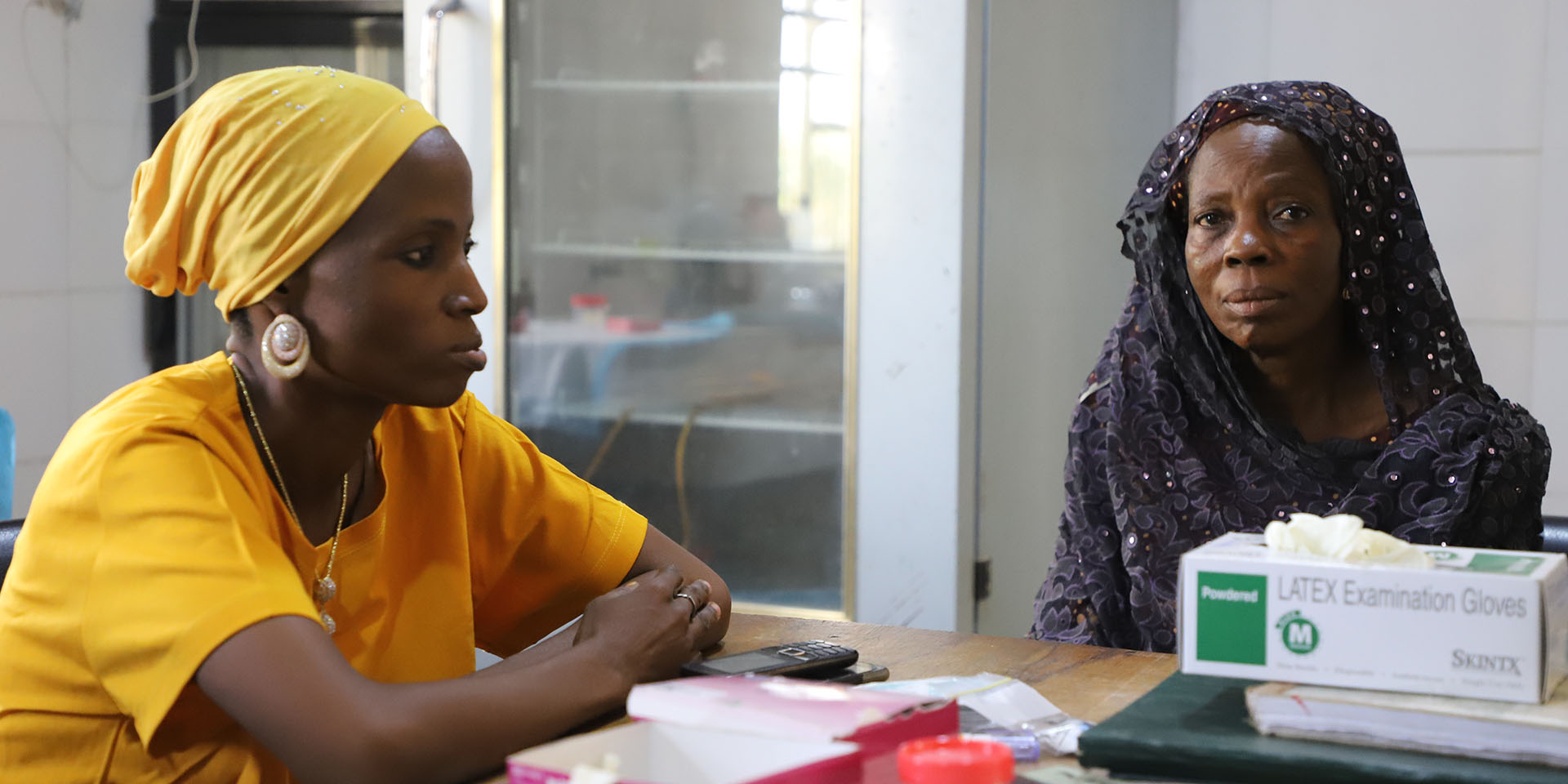 Zainab interacting with her caregiver at the Lafiagi General Hospital.
