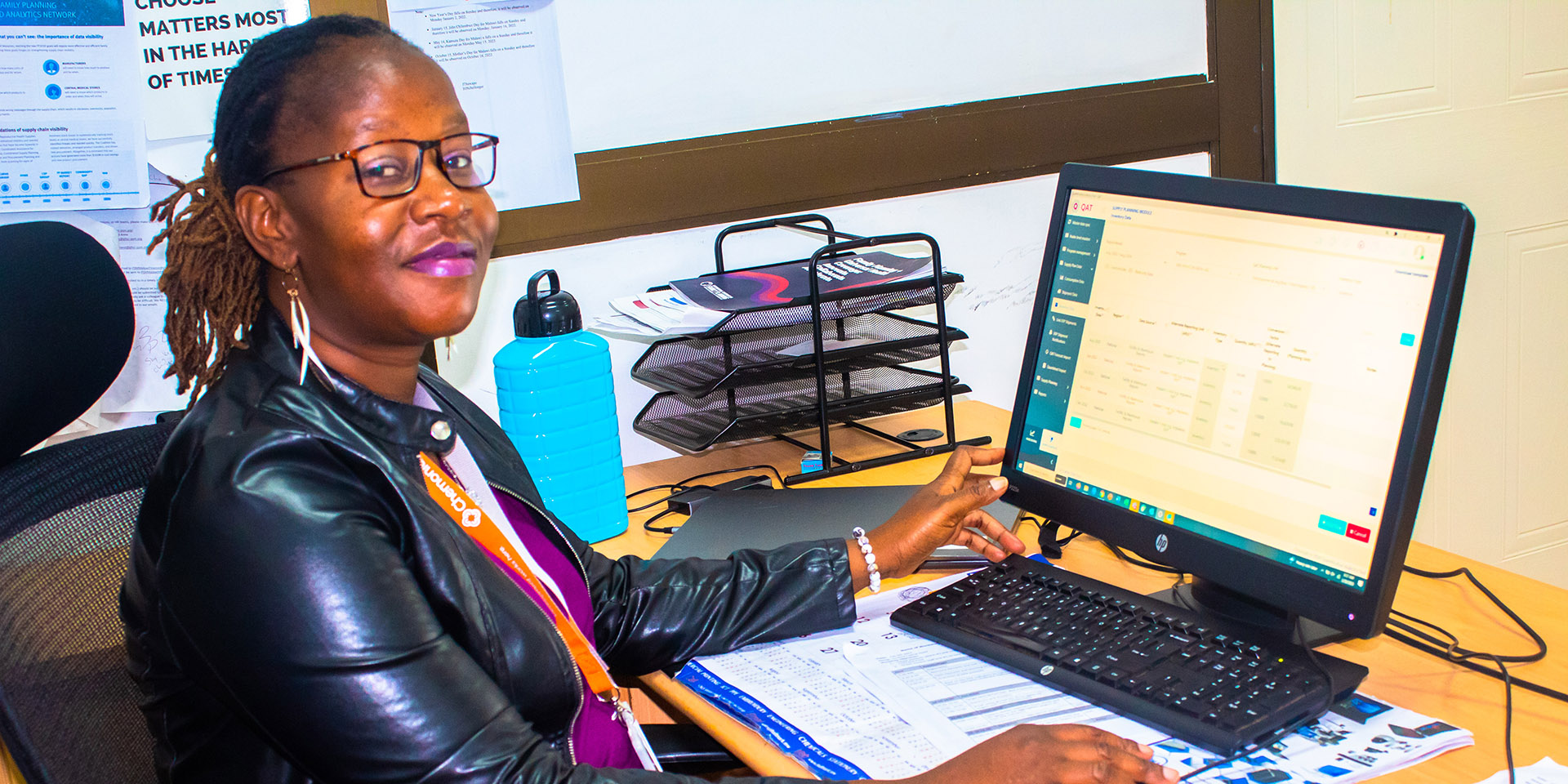 Flora Kalimba at her desk