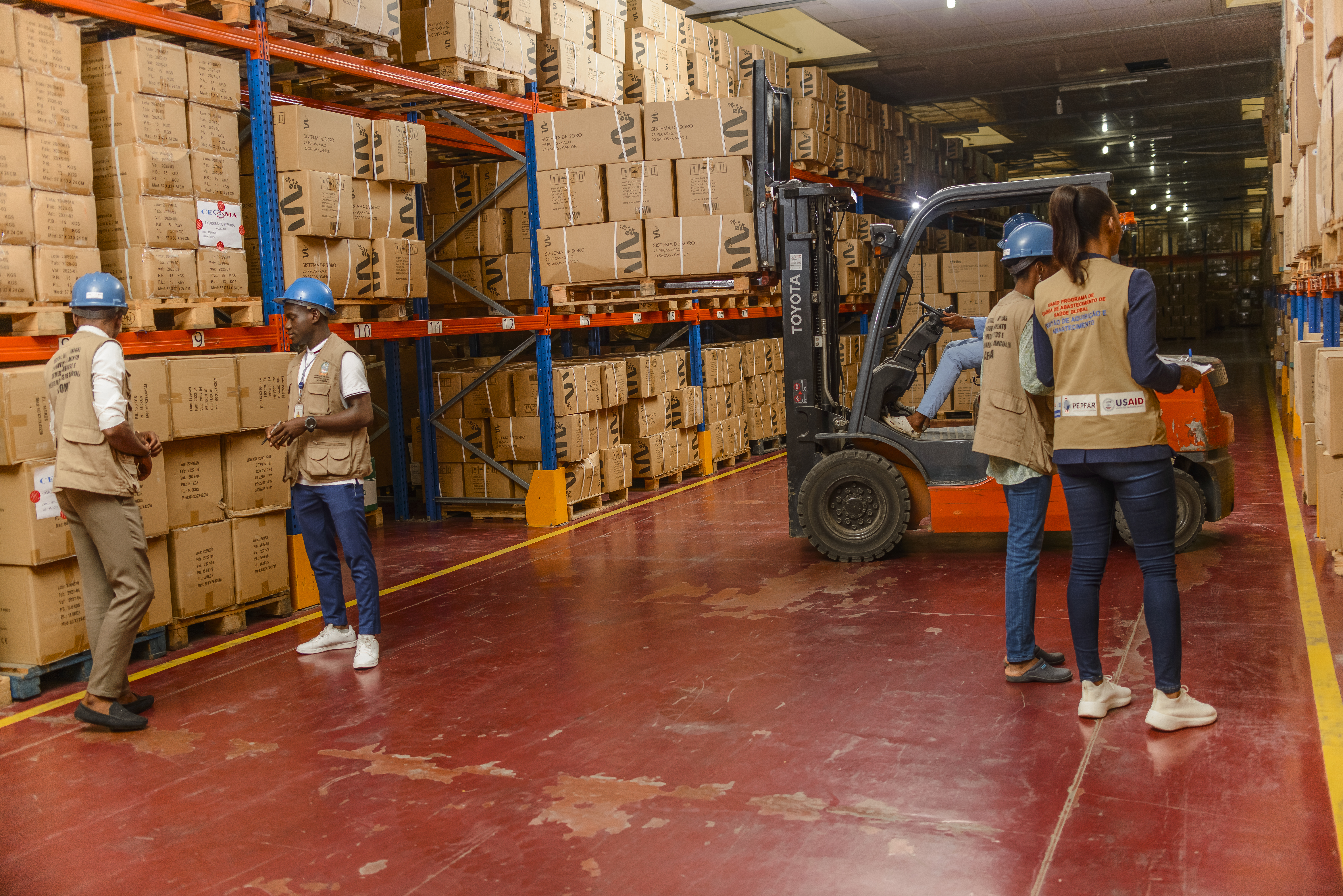 People in a warehouse in Angola