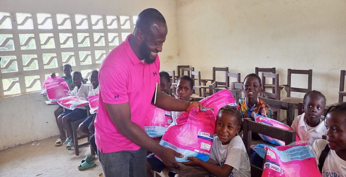 ITNs distribution to students at John Flomo Bakalu School.