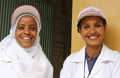 Two women workers smiling